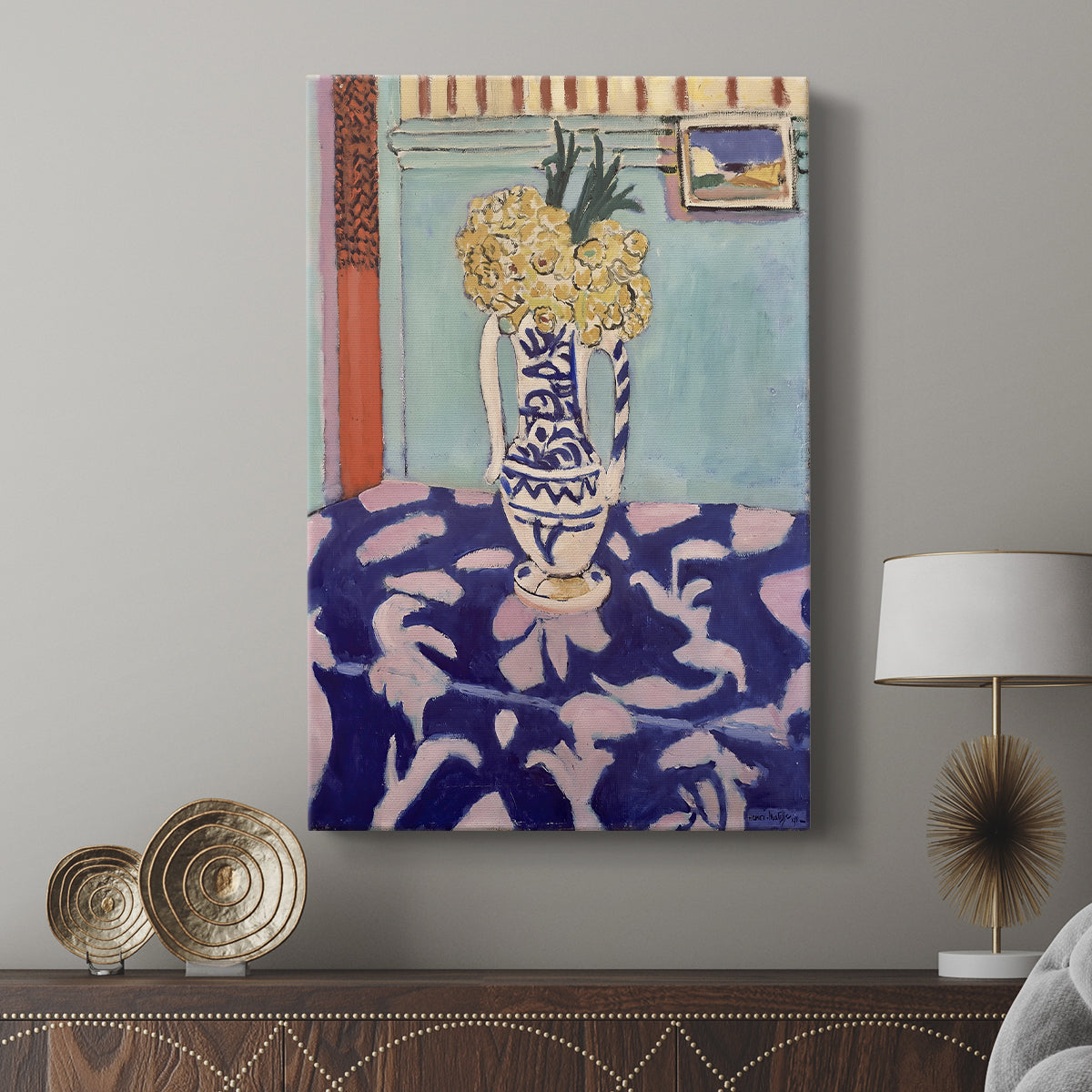 Canvas art print featuring a stylized arrangement of blossoms with flat color and bold design displayed in a modern interior space.
