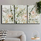 Three-panel canvas wall art featuring vintage floral botanical sketchbook, displayed in a modern living room above a sofa.