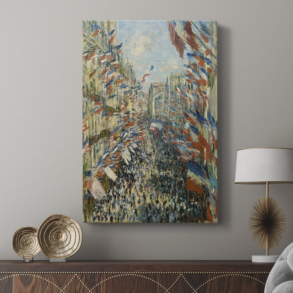 Canvas art print featuring a lively urban scene with banners and people displayed in a modern interior space.