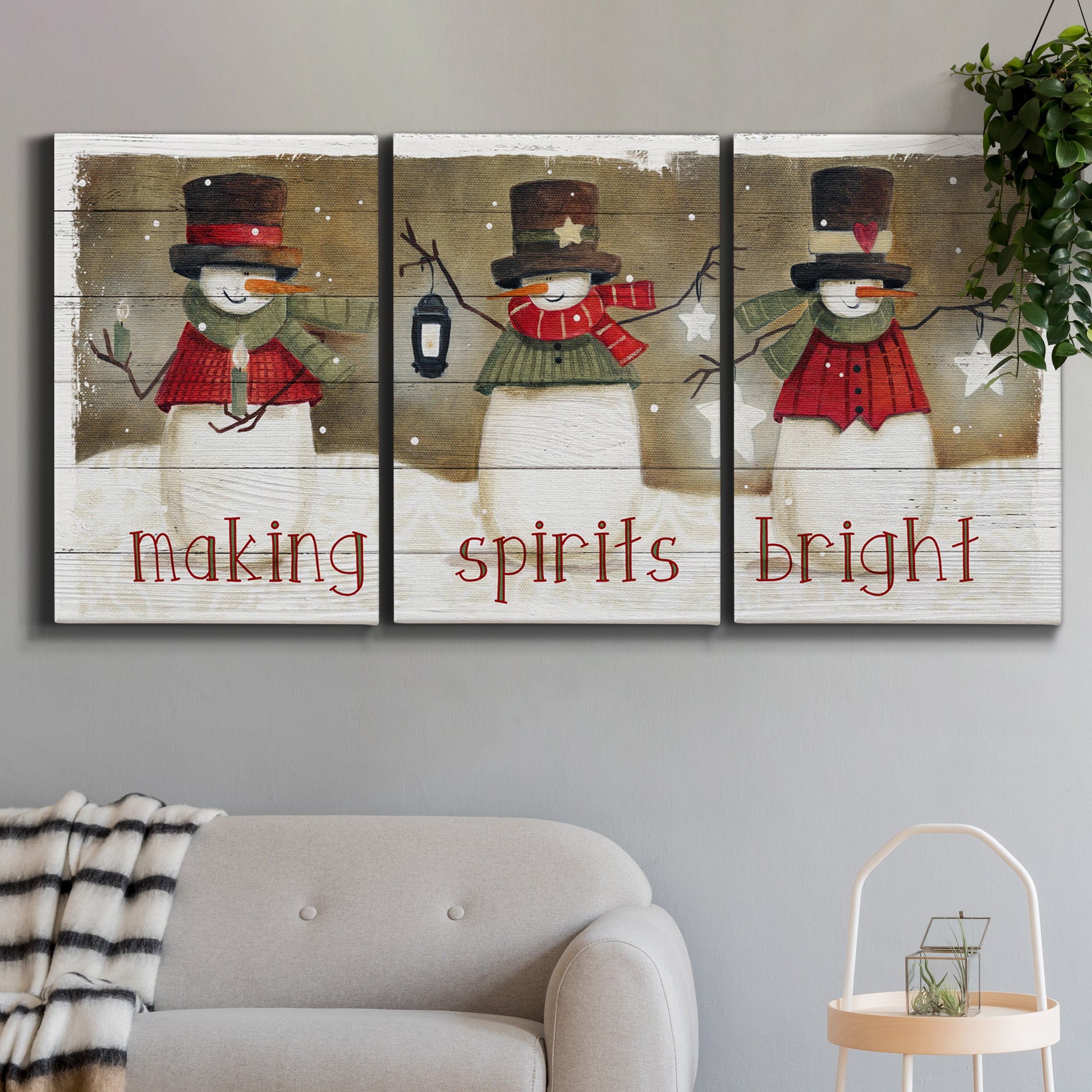 Three-panel canvas wall art featuring misty harbor sunrise with boats, displayed in a modern living room above a sofa.