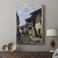 Canvas art print featuring a calm composition with narrow street and subtle detail displayed in a modern interior space.