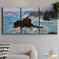 Three-panel canvas wall art featuring storm waves battering rocky coast, displayed in a modern living room above a sofa.