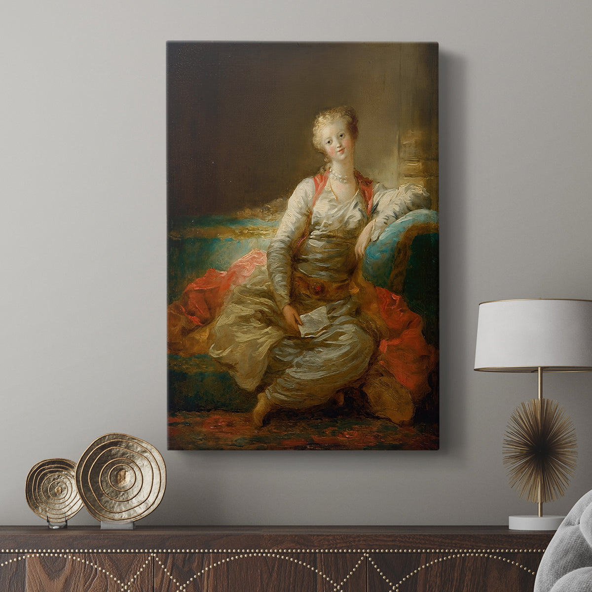 Canvas art print featuring a stylized figure in a relaxed pose with ornate detail displayed in a modern interior space.