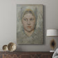 Canvas art print featuring a refined portrait with subtle color and smooth detail displayed in a modern interior space.