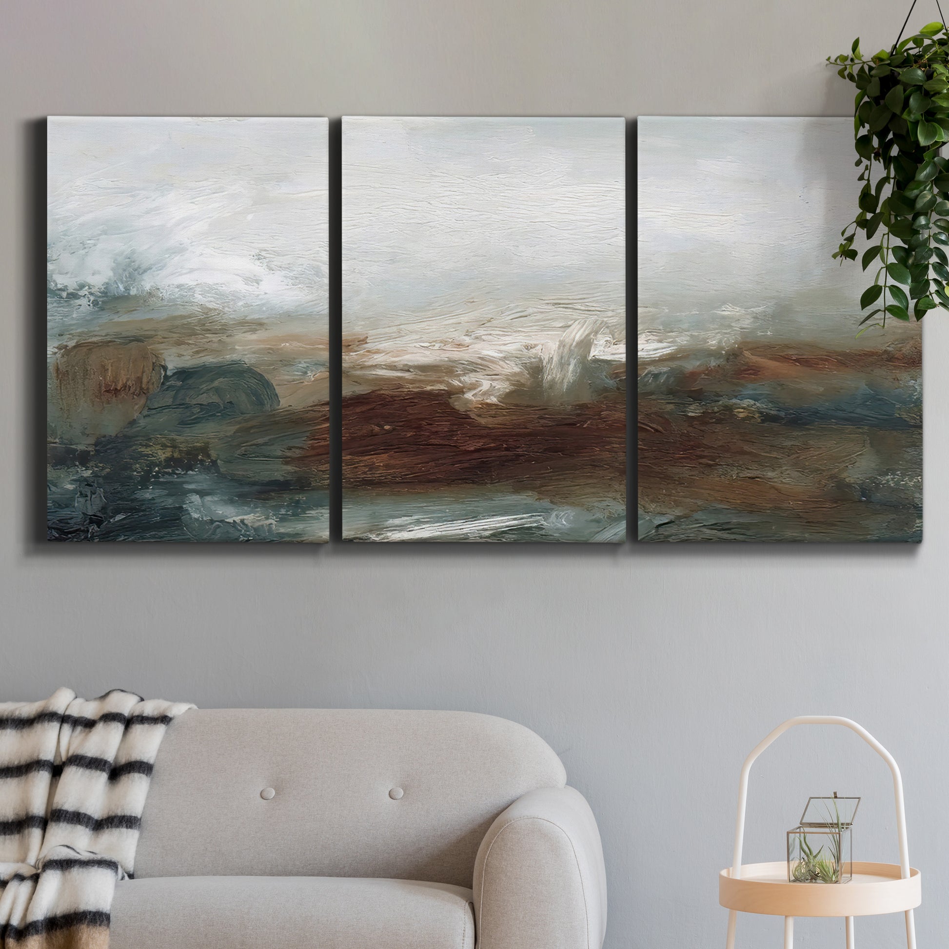 Three-panel canvas wall art featuring soft abstract evening light, displayed in a modern living room above a sofa.
