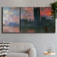 Three-panel canvas wall art featuring parliament silhouetted at dusk, displayed in a modern living room above a sofa.