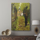 Canvas art print featuring a calm landscape with a solitary artist and soft light displayed in a modern interior space.