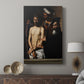 Canvas art print featuring a tense moment with expressive figures and dark background displayed in a modern interior space.