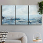 Three-panel canvas wall art featuring abstract sailboats on water, displayed in a modern living room above a sofa.
