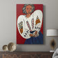 Canvas art print featuring a bright portrait with decorative detail and flat color displayed in a modern interior space.