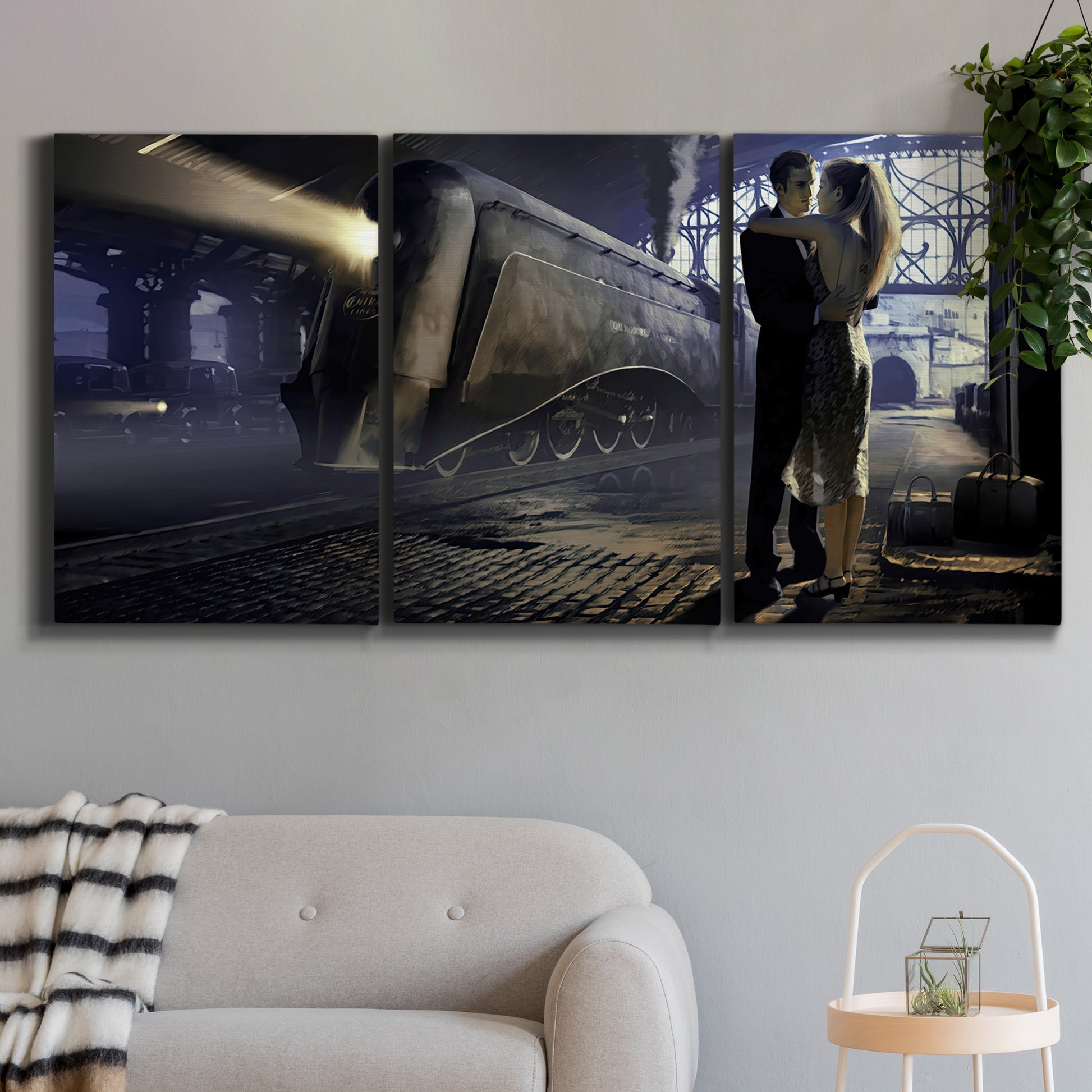 Three-panel canvas wall art featuring couple kissing at train station, displayed in a modern living room above a sofa.