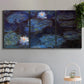 Three-panel canvas wall art featuring deep blue water lily reflections, displayed in a modern living room above a sofa.