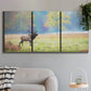 Three-panel canvas wall art featuring resting animals in open field, displayed in a modern living room above a sofa.