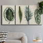 Three-panel canvas wall art featuring botanical palm leaf illustration, displayed in a modern living room above a sofa.