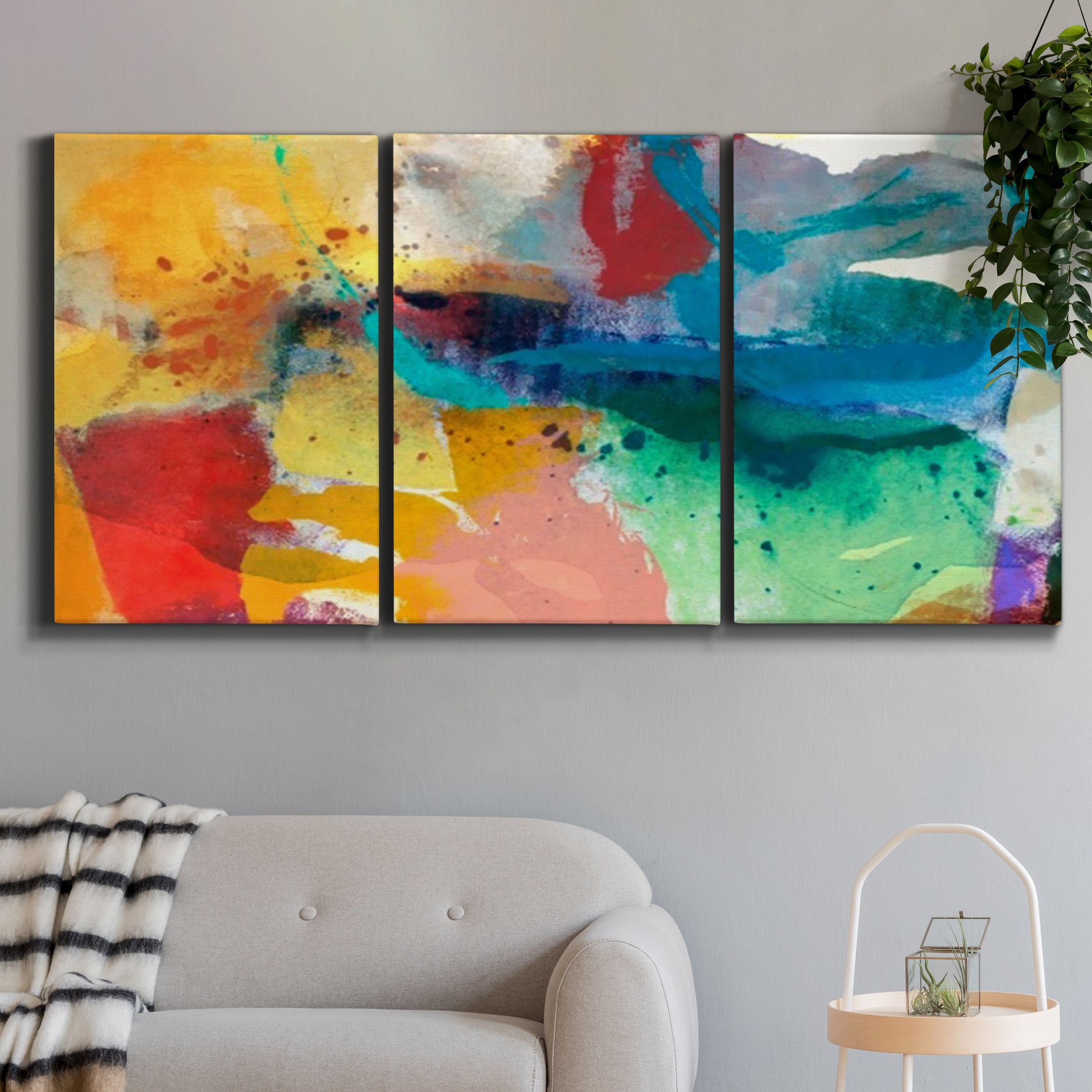 Three-panel canvas wall art featuring layered abstract observational color blocks, displayed in a modern living room above a sofa.