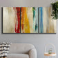Three-panel canvas wall art featuring abstract divided color hemisphere forms, displayed in a modern living room above a sofa.