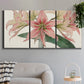 Three-panel canvas wall art featuring vintage styled amaryllis floral study, displayed in a modern living room above a sofa.