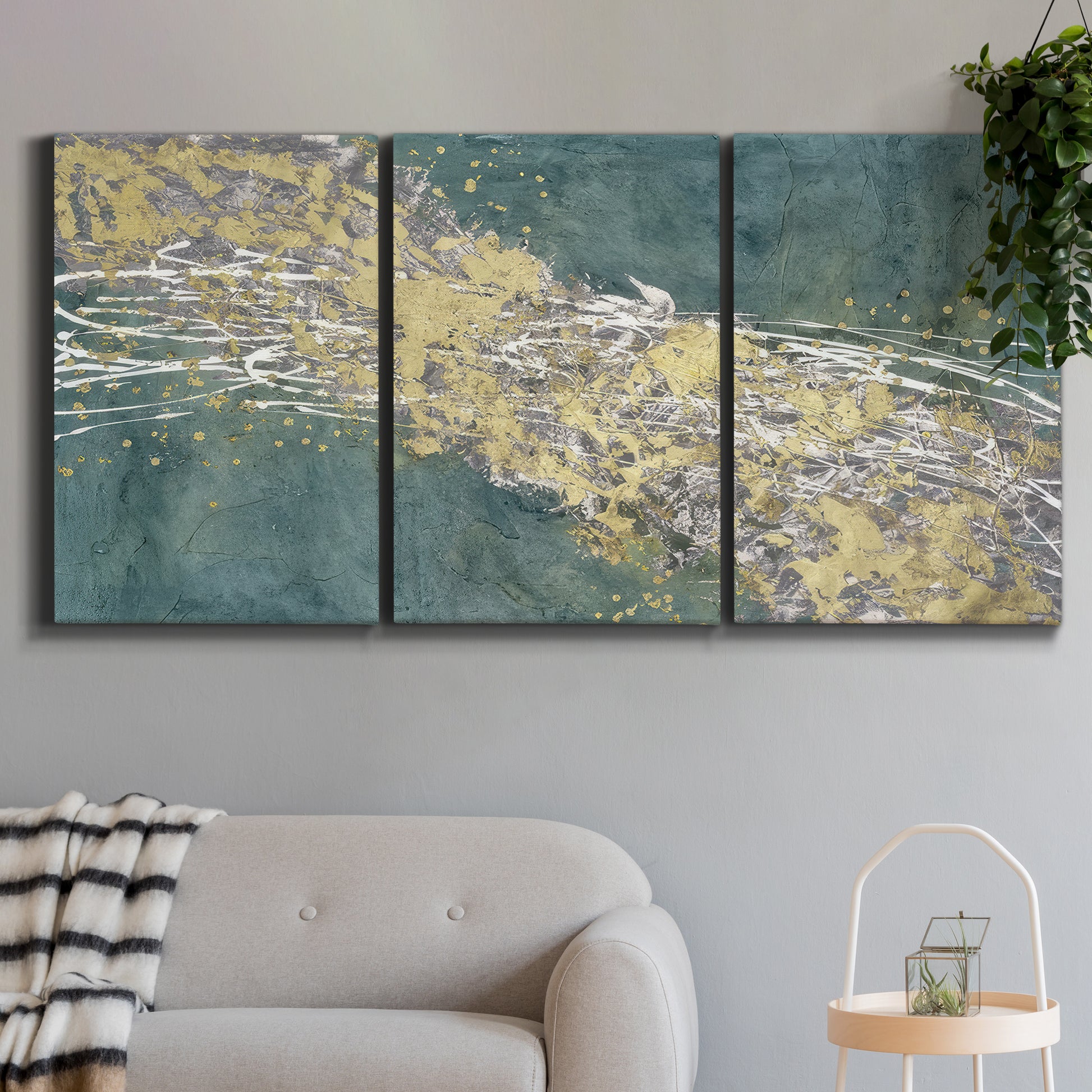 Three-panel canvas wall art featuring soft abstract wind movement, displayed in a modern living room above a sofa.