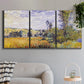 Three-panel canvas wall art featuring river village landscape with hills, displayed in a modern living room above a sofa.