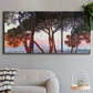 Three-panel canvas wall art featuring sunlit pines along mediterranean coast, displayed in a modern living room above a sofa.