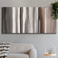 Three-panel canvas wall art featuring riverbank landscape with reflections, displayed in a modern living room above a sofa.