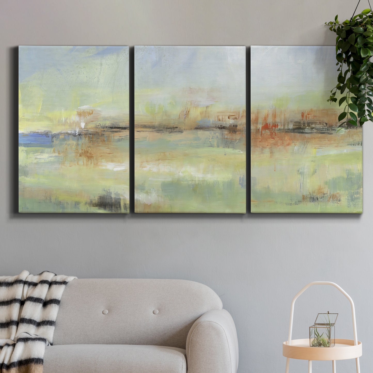 Three-panel canvas wall art featuring layered abstract transitional textures, displayed above a desk in a home office.