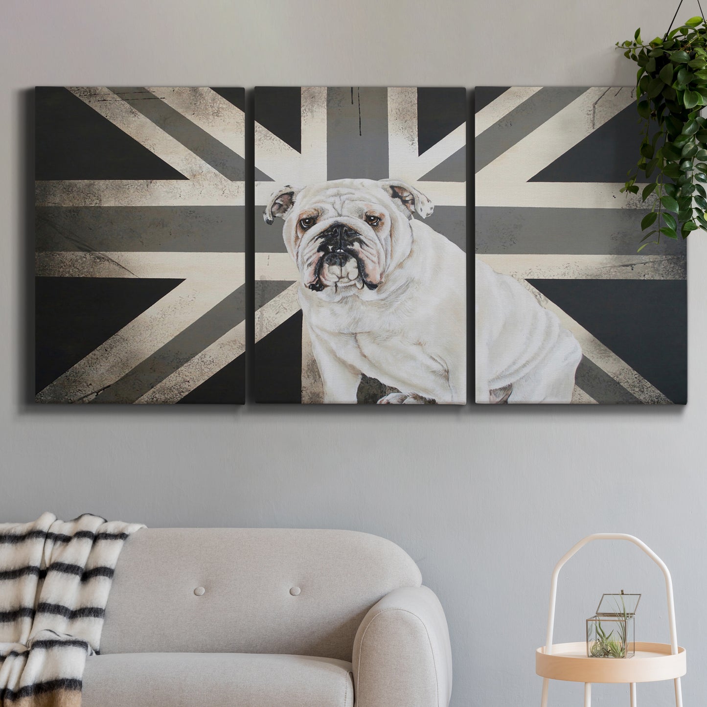 Three-panel canvas wall art featuring black and white animal collage, displayed in a modern living room above a sofa.
