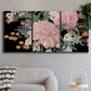 Three-panel canvas wall art featuring dark floral night blossoms, displayed in a modern living room above a sofa.