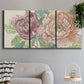 Three-panel canvas wall art featuring pastel peony flower composition, displayed in a modern living room above a sofa.