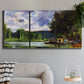 Three-panel canvas wall art featuring riverbank landscape near village, displayed in a modern living room above a sofa.