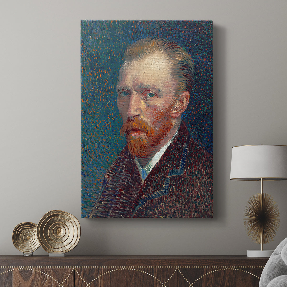 Canvas art print featuring a stylized portrait with energetic lines and bold tones displayed in a modern interior space.