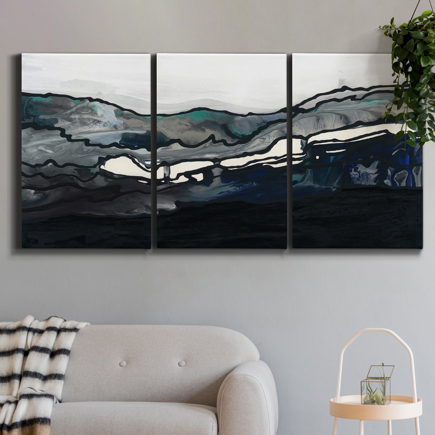 Three-panel canvas wall art featuring abstract passage of time composition, displayed in a modern living room above a sofa.