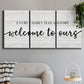 Three-panel canvas wall art featuring tropical beach at sunset photograph, displayed in a modern living room above a sofa.
