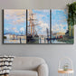 Three-panel canvas wall art featuring busy river port scene, displayed in a modern living room above a sofa.