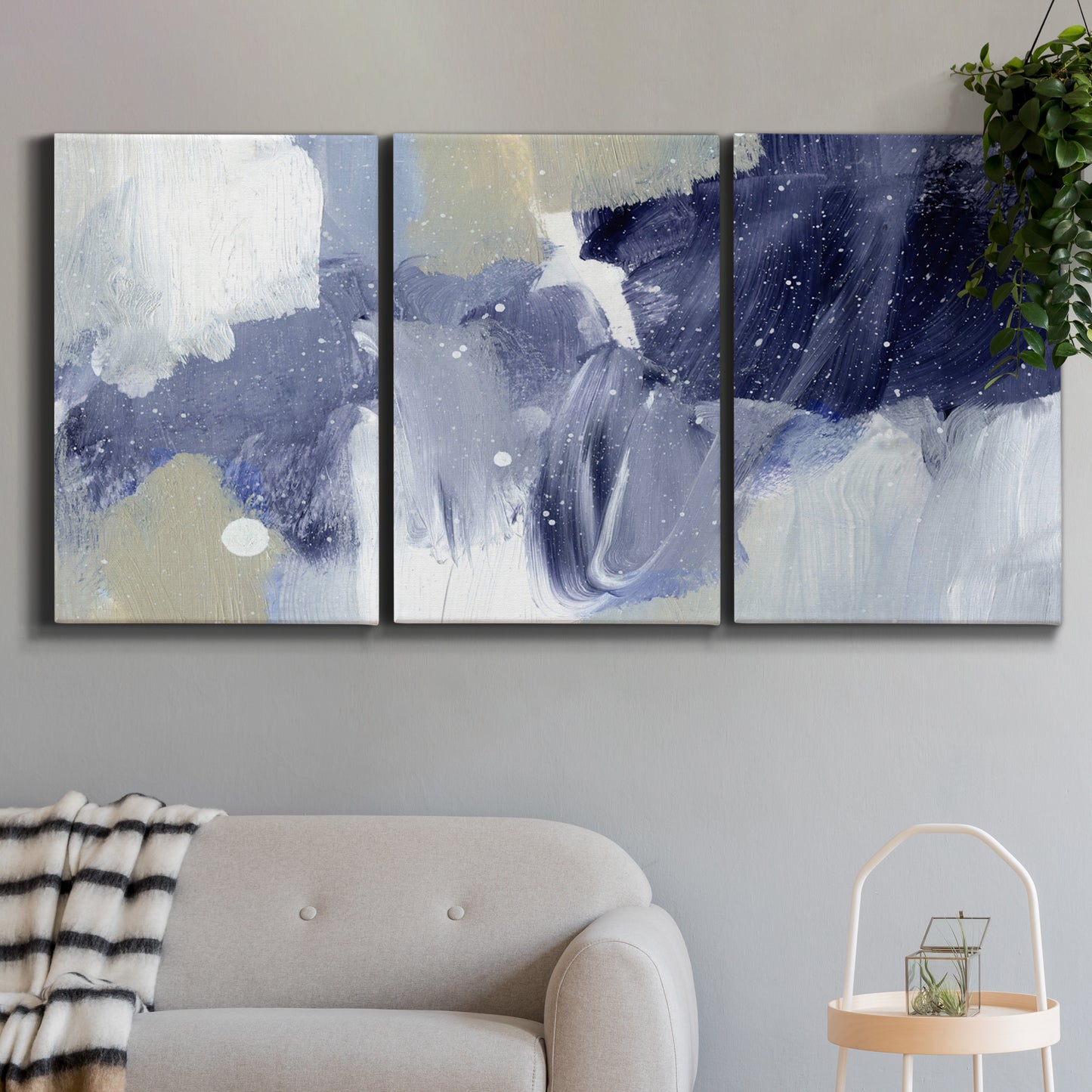 Three-panel canvas wall art featuring abstract sky break composition, displayed in a modern living room above a sofa.