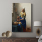 Canvas art print featuring a focused figure with warm tones and structured composition displayed in a modern interior space.