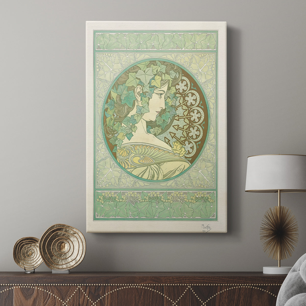 Canvas art print featuring a decorative portrait with flowing hair and botanical elements displayed in a modern interior space.