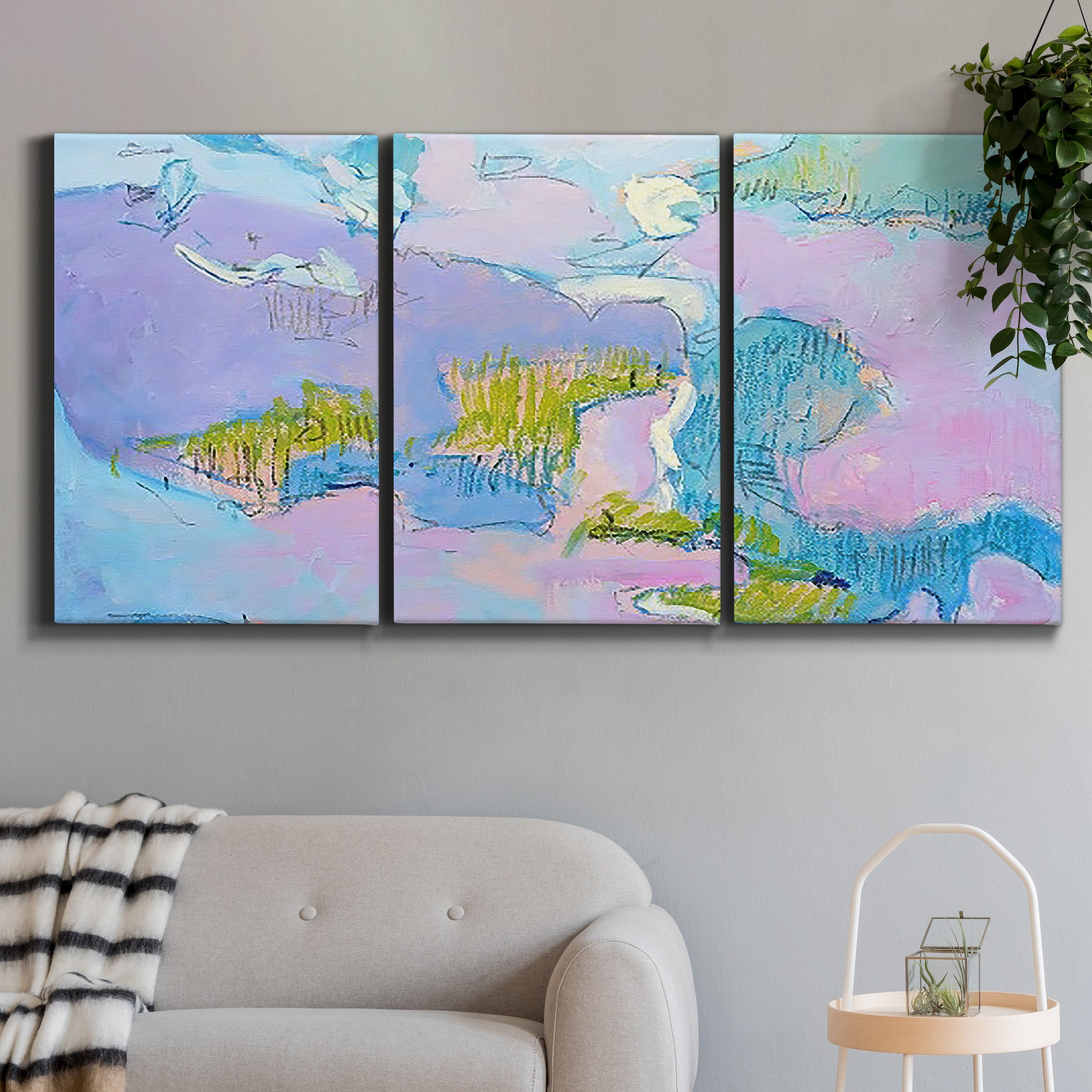 Three-panel canvas wall art featuring abstract view through window forms, displayed in a modern living room above a sofa.