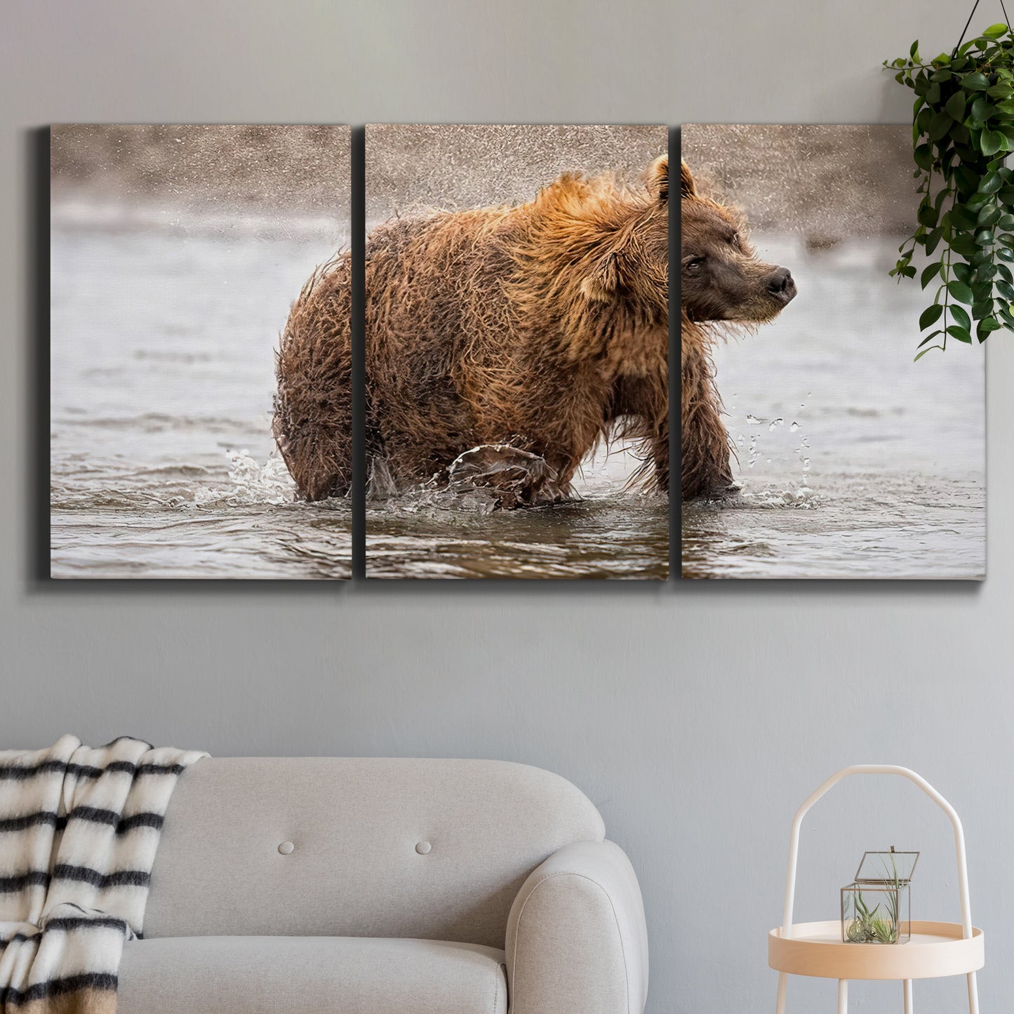 Three-panel canvas wall art featuring wildlife photography animal portrait, displayed in a modern living room above a sofa.