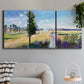 Three-panel canvas wall art featuring riverside path with figures, displayed in a modern living room above a sofa.
