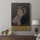 Canvas art print featuring a refined portrait with subtle color and smooth texture displayed in a modern interior space.