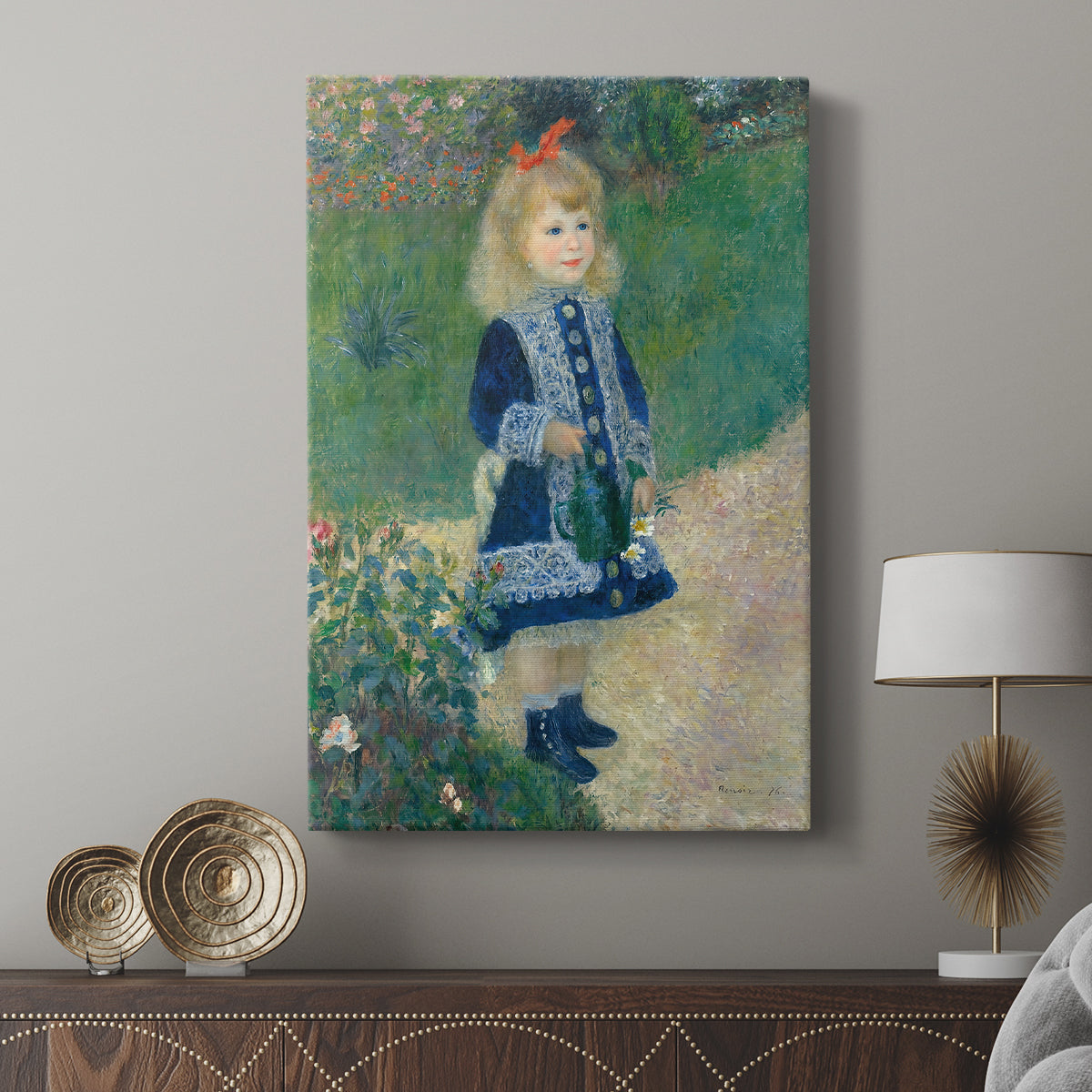 Canvas art print featuring a garden scene with a young girl in light-filled surroundings displayed in a modern interior space.
