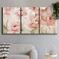 Three-panel canvas wall art featuring spring floral blossoms in bloom, displayed in a modern living room above a sofa.