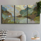 Three-panel canvas wall art featuring abstract landscape suggesting travel pause, displayed in a modern living room above a sofa.