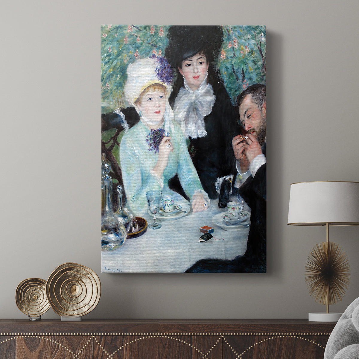 Canvas art print featuring a social moment with figures seated in a light-filled space displayed in a modern interior space.