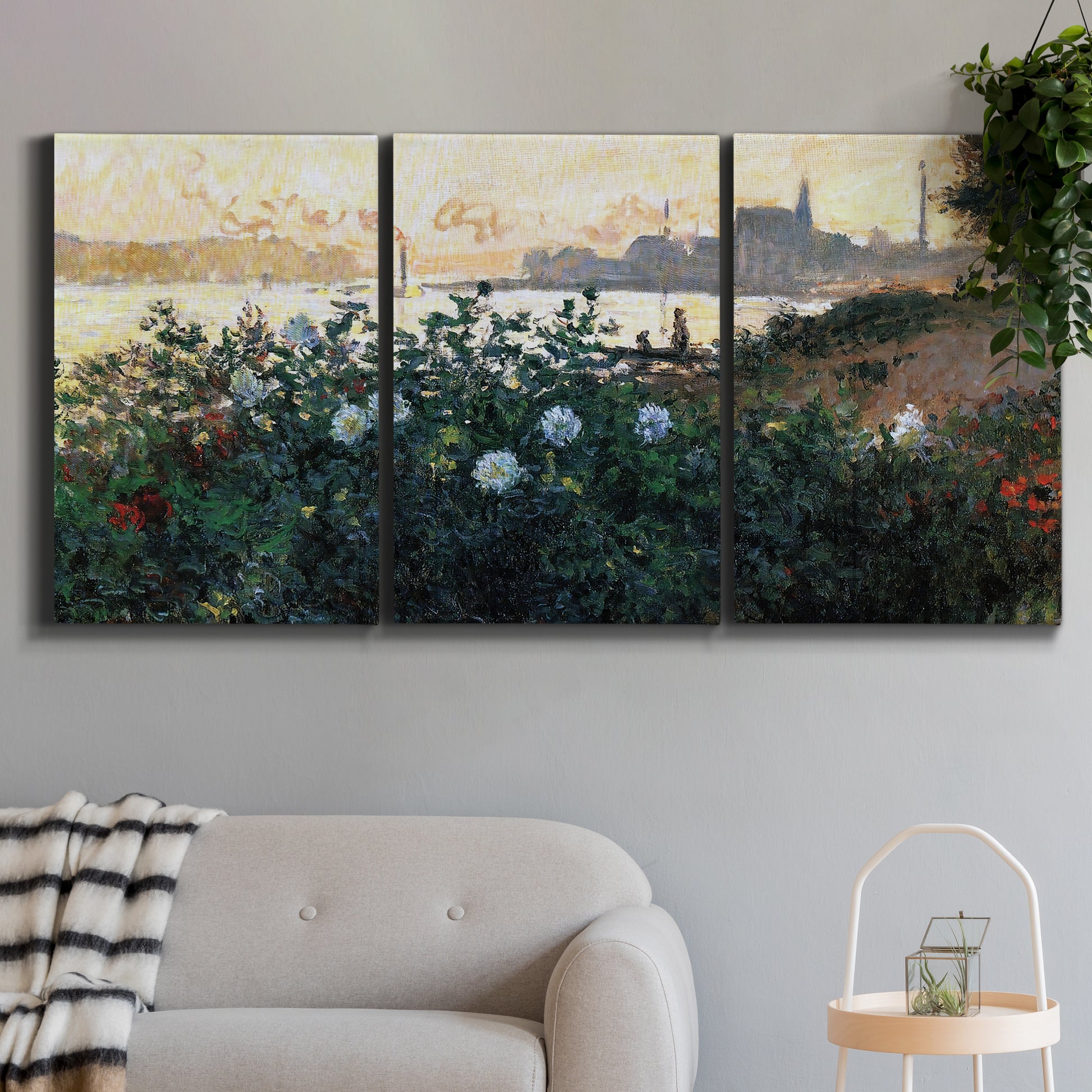 Three-panel canvas wall art featuring formal garden near museum grounds, displayed in a modern living room above a sofa.