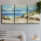 Three-panel canvas wall art featuring sand dunes beside open water, displayed in a modern living room above a sofa.