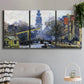 Three-panel canvas wall art featuring historic tower beside canal, displayed in a modern living room above a sofa.