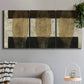 Three-panel canvas wall art featuring textured abstract vessel forms, displayed in a modern living room above a sofa.