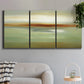 Three-panel canvas wall art featuring green focused abstract color vision, displayed in a modern living room above a sofa.